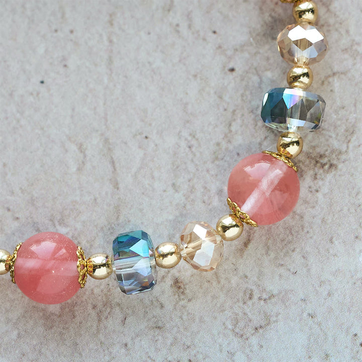 Bracciale Christianartworkshop con cristalli rosa e perline sfaccettate e crocifisso dorato: fede abbagliante per uno stile quotidiano - image 9