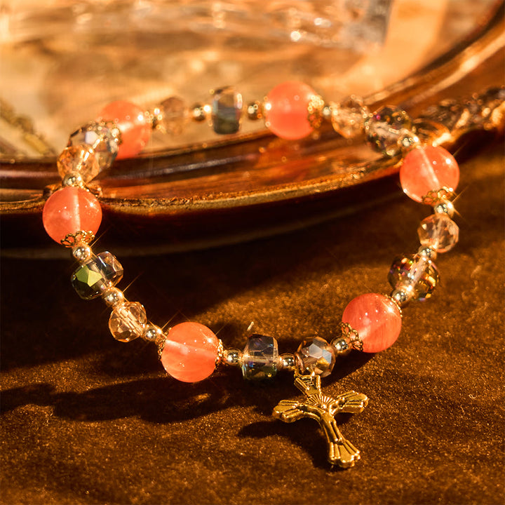 Bracciale Christianartworkshop con cristalli rosa e perline sfaccettate e crocifisso dorato: fede abbagliante per uno stile quotidiano - image 5