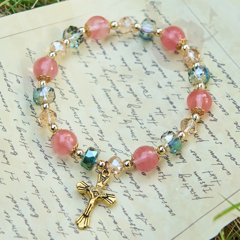 Bracciale Christianartworkshop con cristalli rosa e perline sfaccettate e crocifisso dorato: fede abbagliante per uno stile quotidiano - image 2
