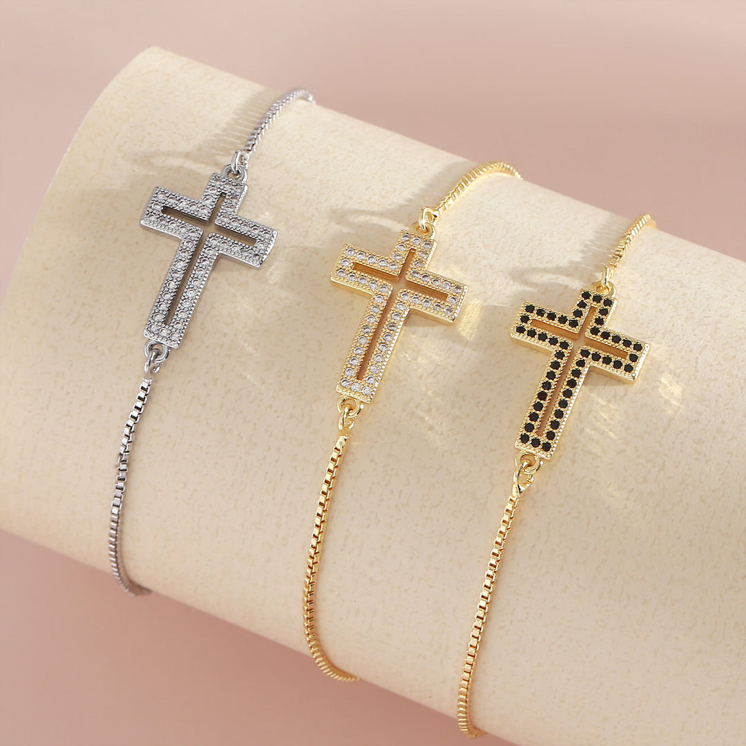 Christianartworkshop Bracciale con croce in zirconi dorati/argento/neri: incarna la grazia della croce - image 0