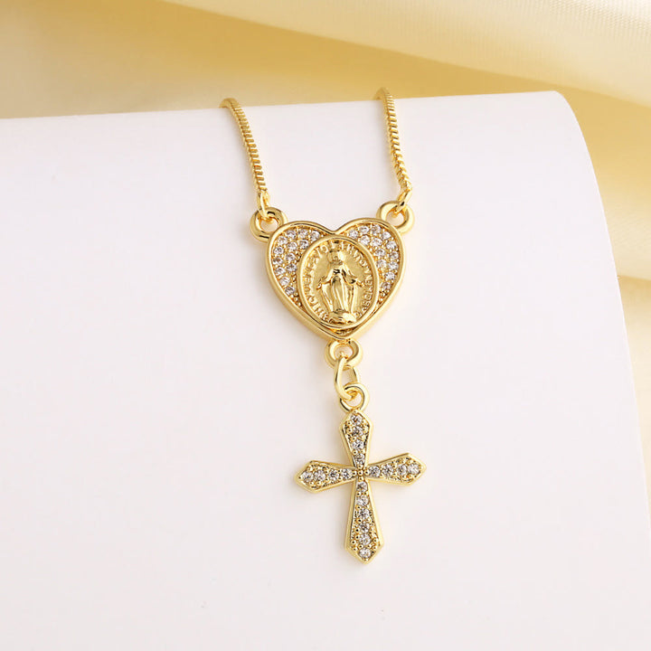 Collana con cuore e croce della Madonna e di San Benedetto tempestata di zirconi, realizzata Christianartworkshop : la grazia divina da indossare tutti i giorni. - Nostra Signora (B) - image 3