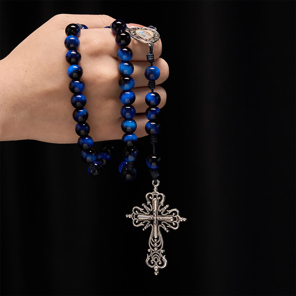 Christianartworkshop Rosario in occhio di tigre blu con crocifisso color argento: simbolo dell'incrollabile forza di Dio. - image 1