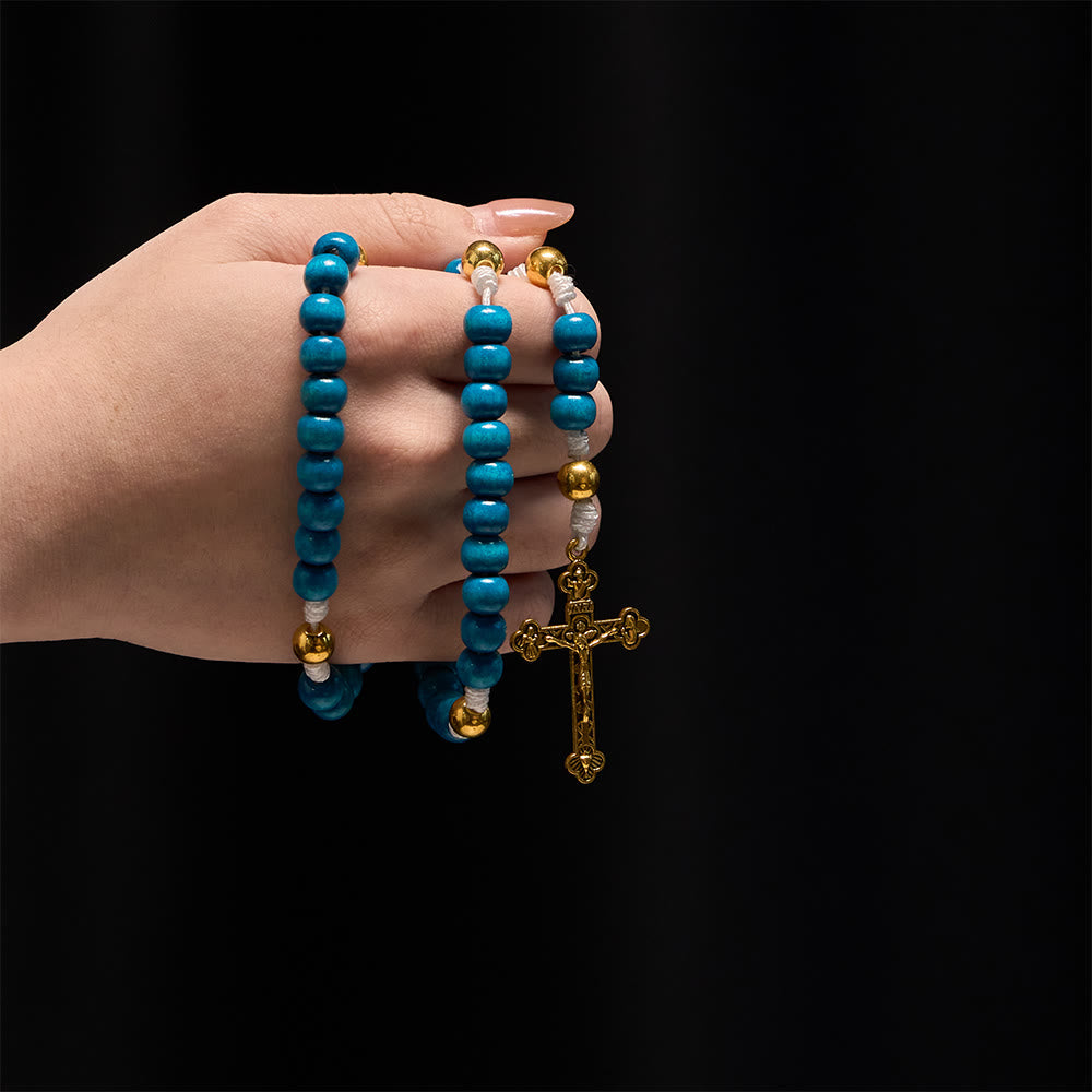Christianartworkshop Rosario con perline di legno blu e medaglione della Madonna: simbolo di grazia e fede divina. - image 1