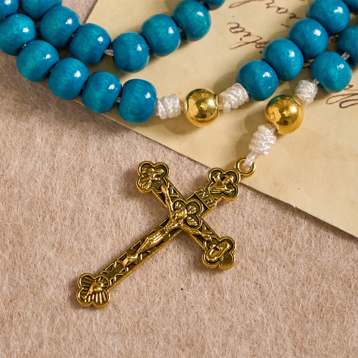 Christianartworkshop Rosario con perline di legno blu e medaglione della Madonna: simbolo di grazia e fede divina. - image 7