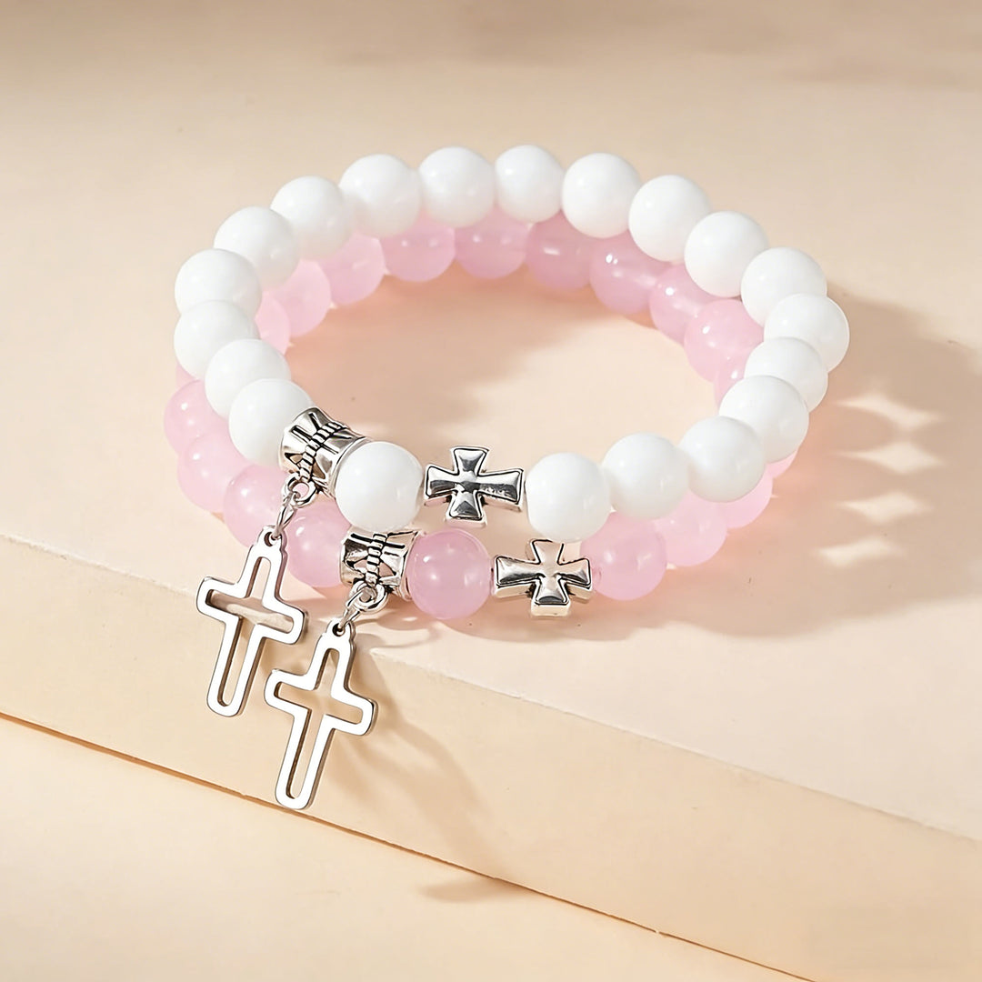 Christianartworkshop Set di braccialetti con ciondoli a croce bicolore: un simbolo di fede da indossare in ogni occasione. - Rosa + Bianco - image 0