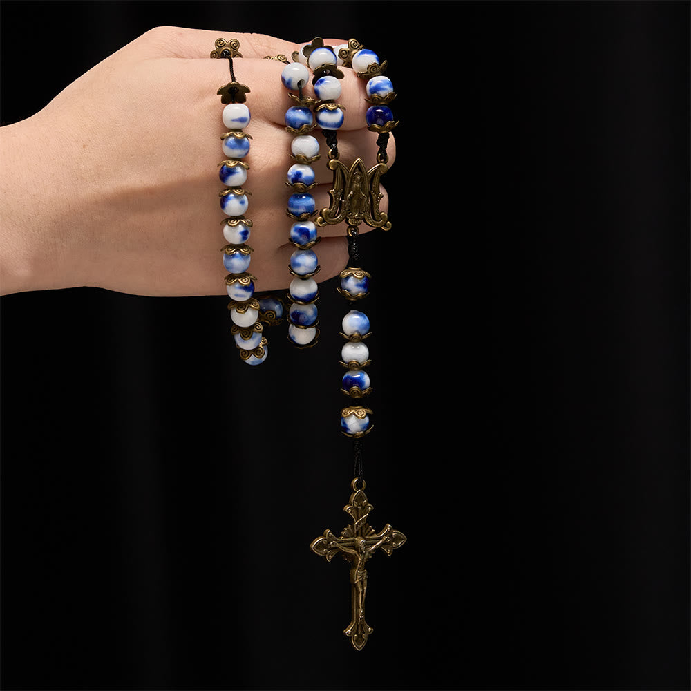 Christianartworkshop Rosario con perline blu e bianche e medaglia miracolosa: un simbolo di intercessione celeste. - image 1