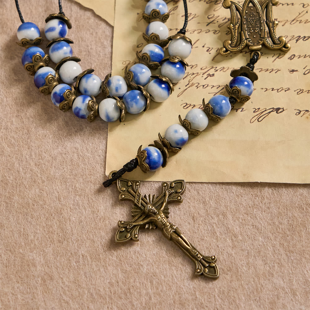 Christianartworkshop Rosario con perline blu e bianche e medaglia miracolosa: un simbolo di intercessione celeste. - image 8