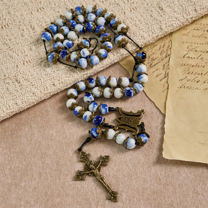 Christianartworkshop Rosario con perline blu e bianche e medaglia miracolosa: un simbolo di intercessione celeste. - image 3