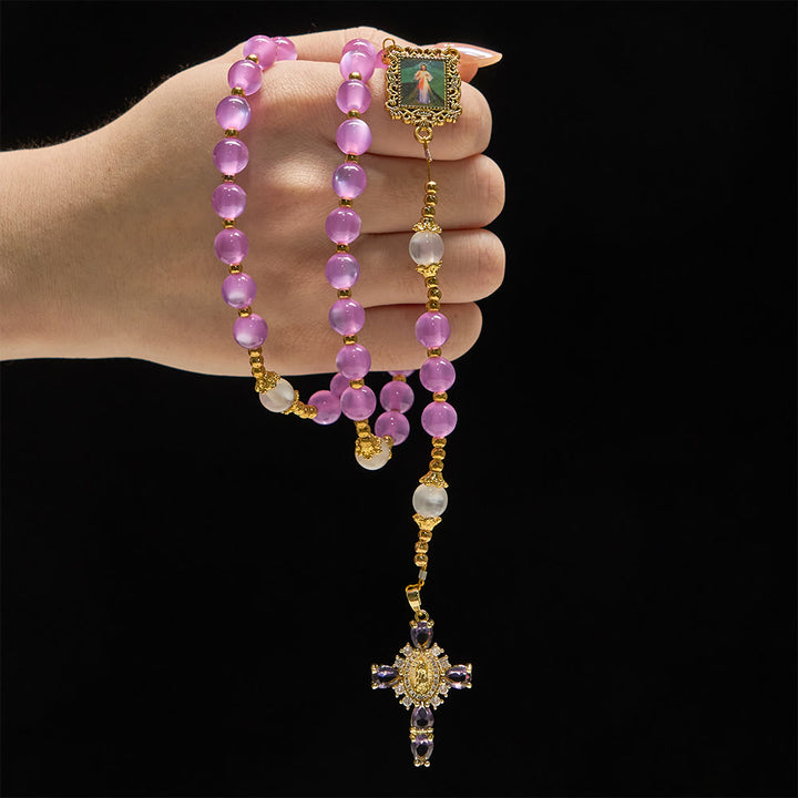 Christianartworkshop Rosario con perle viola occhio di gatto e crocifisso decorato: emblema di guida divina e grazia mariana. - image 1