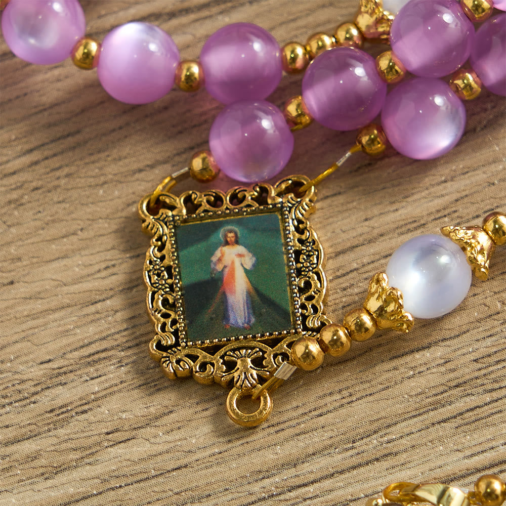 Christianartworkshop Rosario con perle viola occhio di gatto e crocifisso decorato: emblema di guida divina e grazia mariana. - image 7