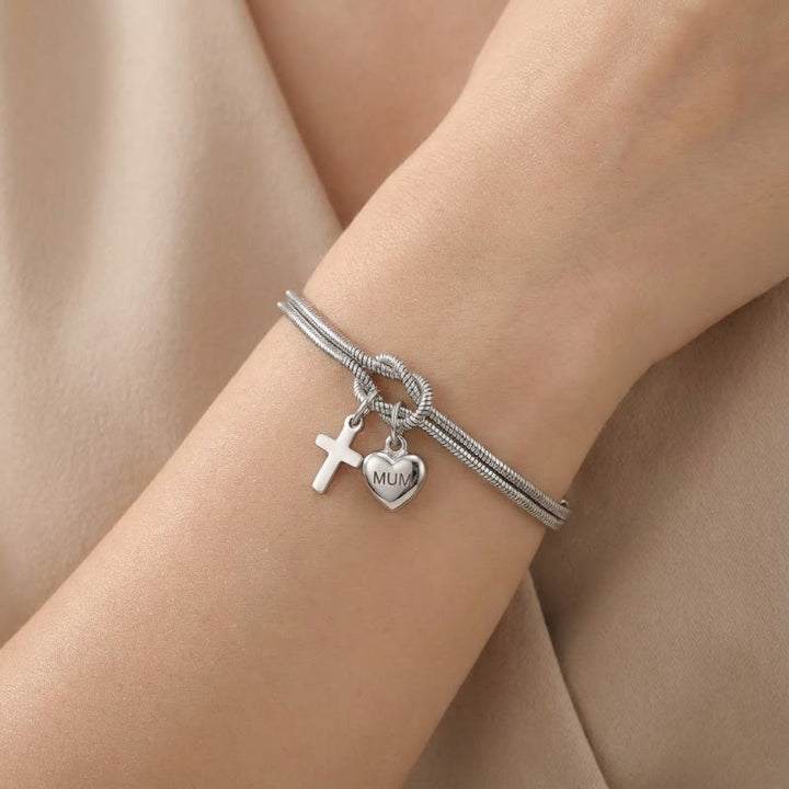 Christianartworkshop Bracciale regolabile con ciondolo a forma di cuore e croce con nodo d'amore: emblema di devozione e grazia divina. - Argento - image 0