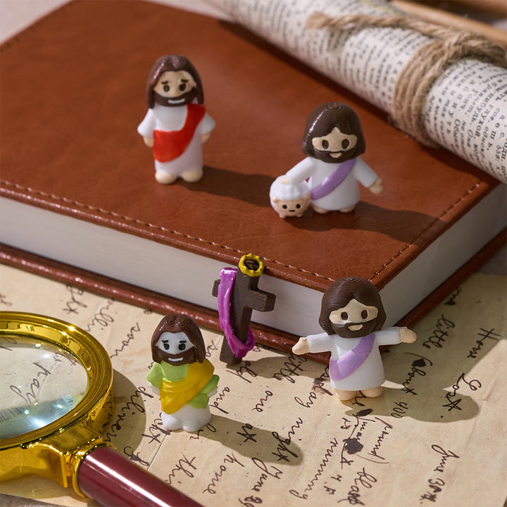 Christianartworkshop Mini statuetta in resina di Gesù con tunica colorata in stile chibi e croce: un caldo abbraccio sacro per la devozione quotidiana. - image 0