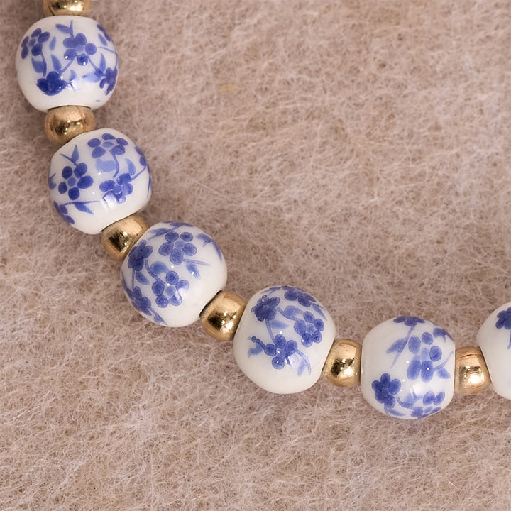 Christianartworkshop Bracciale in ceramica blu/rosa con motivo floreale e grande perlina bianca decorativa: un promemoria della grazia divina. - image 7