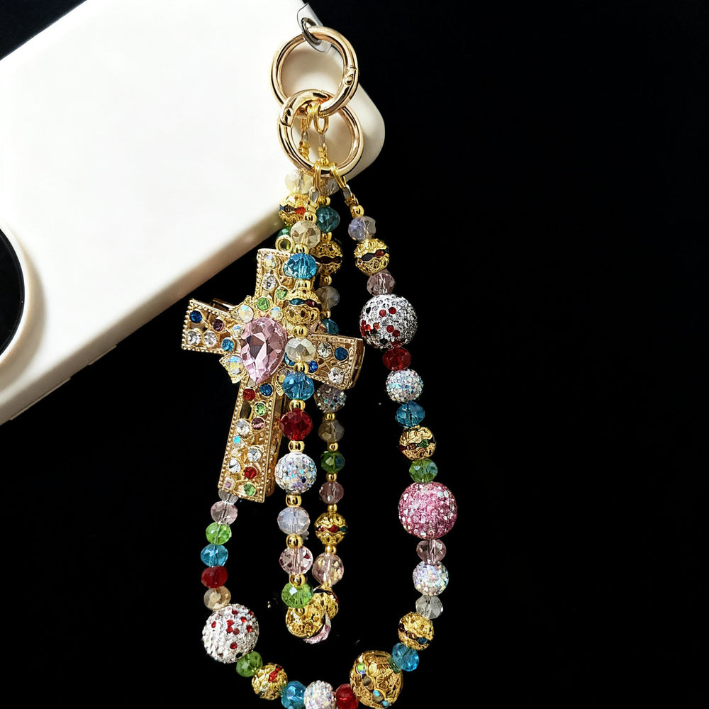 Christianartworkshop Ciondolo per cellulare a forma di croce di cristallo colorata con nappa di perline: un simbolo di fede vibrante e luce divina. - image 1
