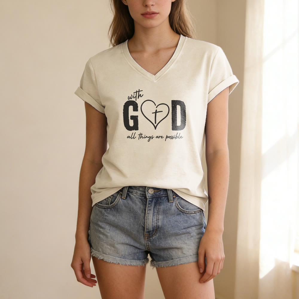 Christianartworkshop Con Dio tutto è possibile. T-shirt casual con scollo a V e stampa a cuore e croce. - image 1