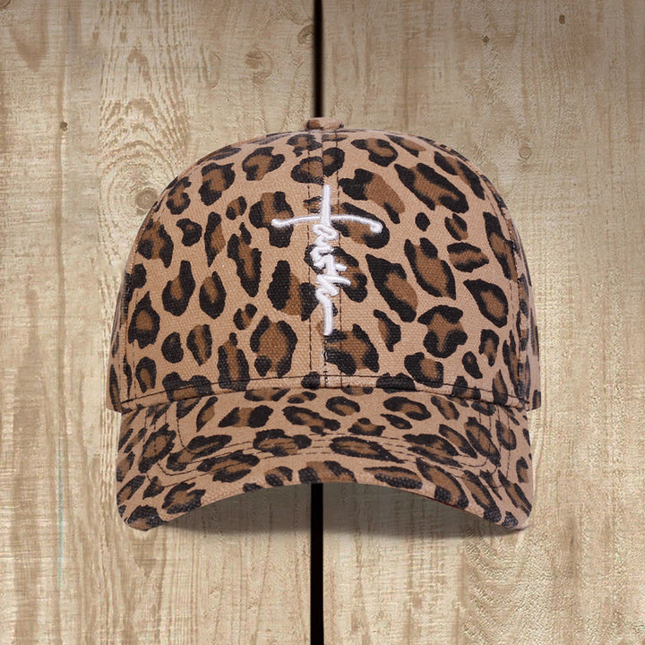 Christianartworkshop Cappellino da baseball unisex con stampa leopardata e ricamo a croce in corsivo "Faith", effetto lavato. - image 0