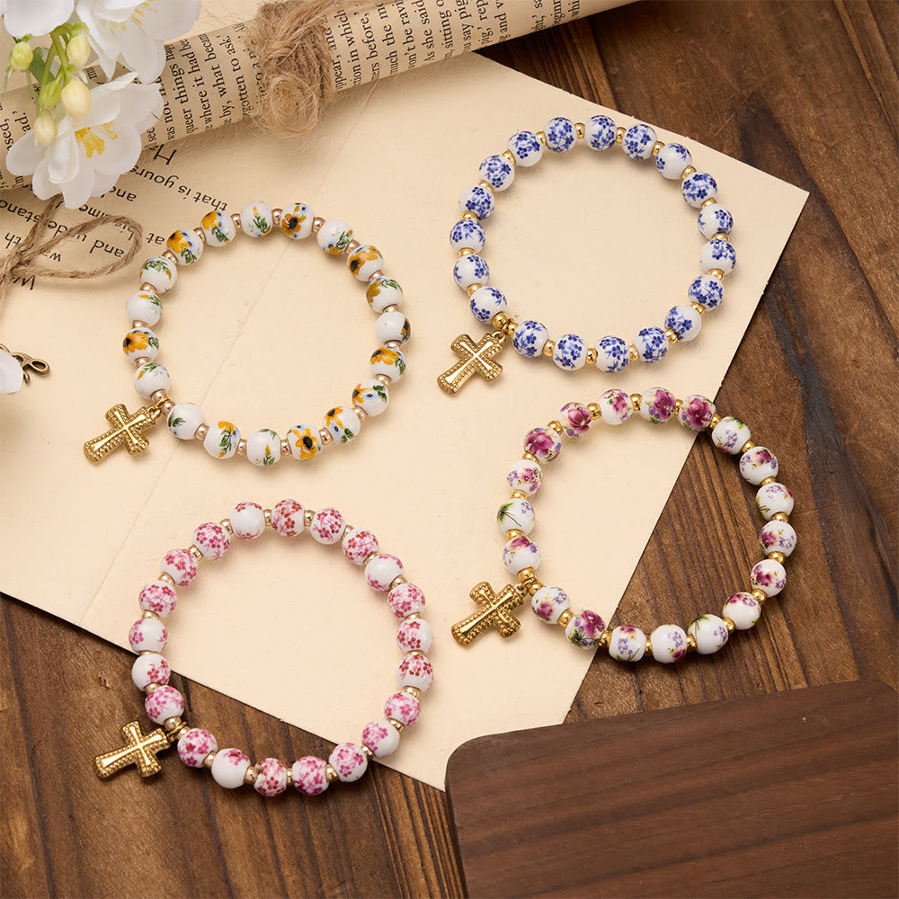 Christianartworkshop Bracciale elastico in ceramica con perline floreali in 4 stili e ciondolo a croce color oro: simbolo di dolce grazia celeste. - image 1