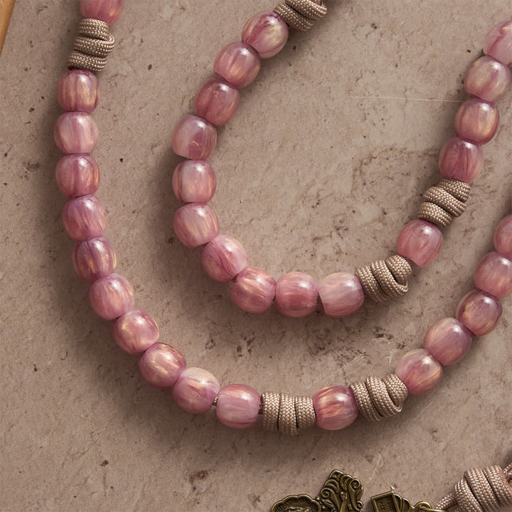 Christianartworkshop Rosario in paracord rosa cipria con San Benedetto in bronzo antico. - image 3