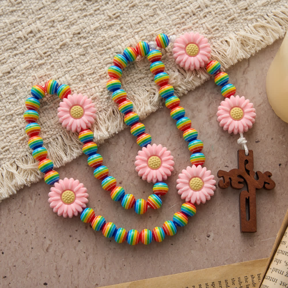 Christianartworkshop Rosario per bambini con perline a strisce arcobaleno, nodi a margherita rosa e croce di Gesù. - image 3