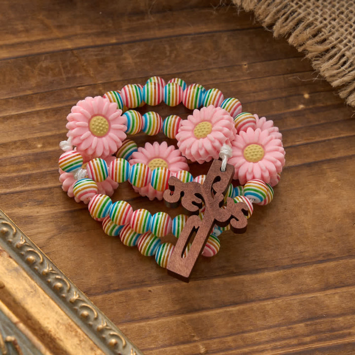 Christianartworkshop Rosario a righe arcobaleno pastello con margherita rosa e accessorio religioso per bambini. - image 4