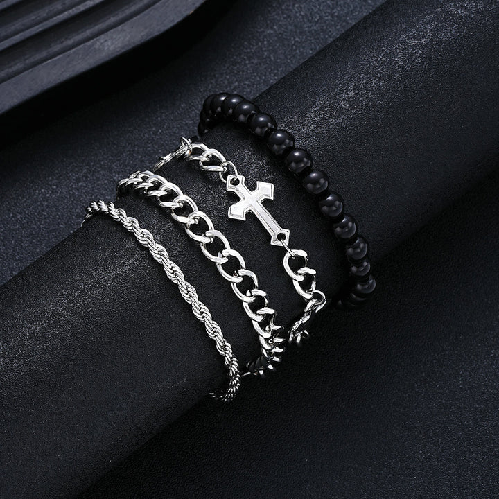 Christianartworkshop Set di 4 bracciali sovrapponibili a strati con corda intrecciata, catena a maglia barbazzale e ciondolo a croce con perline rotonde nere. - Argento - image 0
