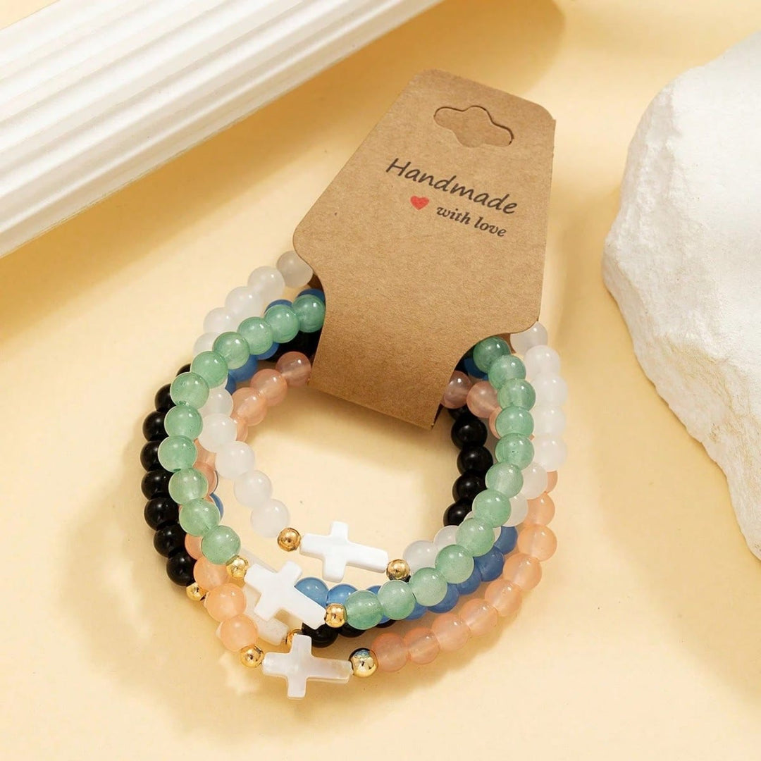 Christianartworkshop Set di braccialetti a croce multistrato con cristalli sfaccettati, minerali opachi e perline rotonde lisce. - image 2