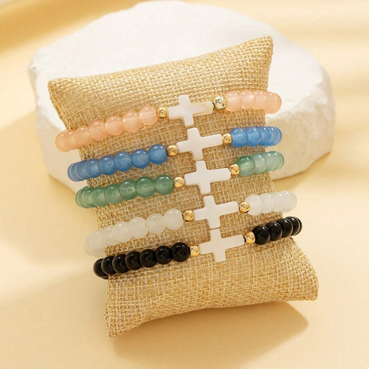 Christianartworkshop Set di braccialetti a croce multistrato con cristalli sfaccettati, minerali opachi e perline rotonde lisce. - image 1