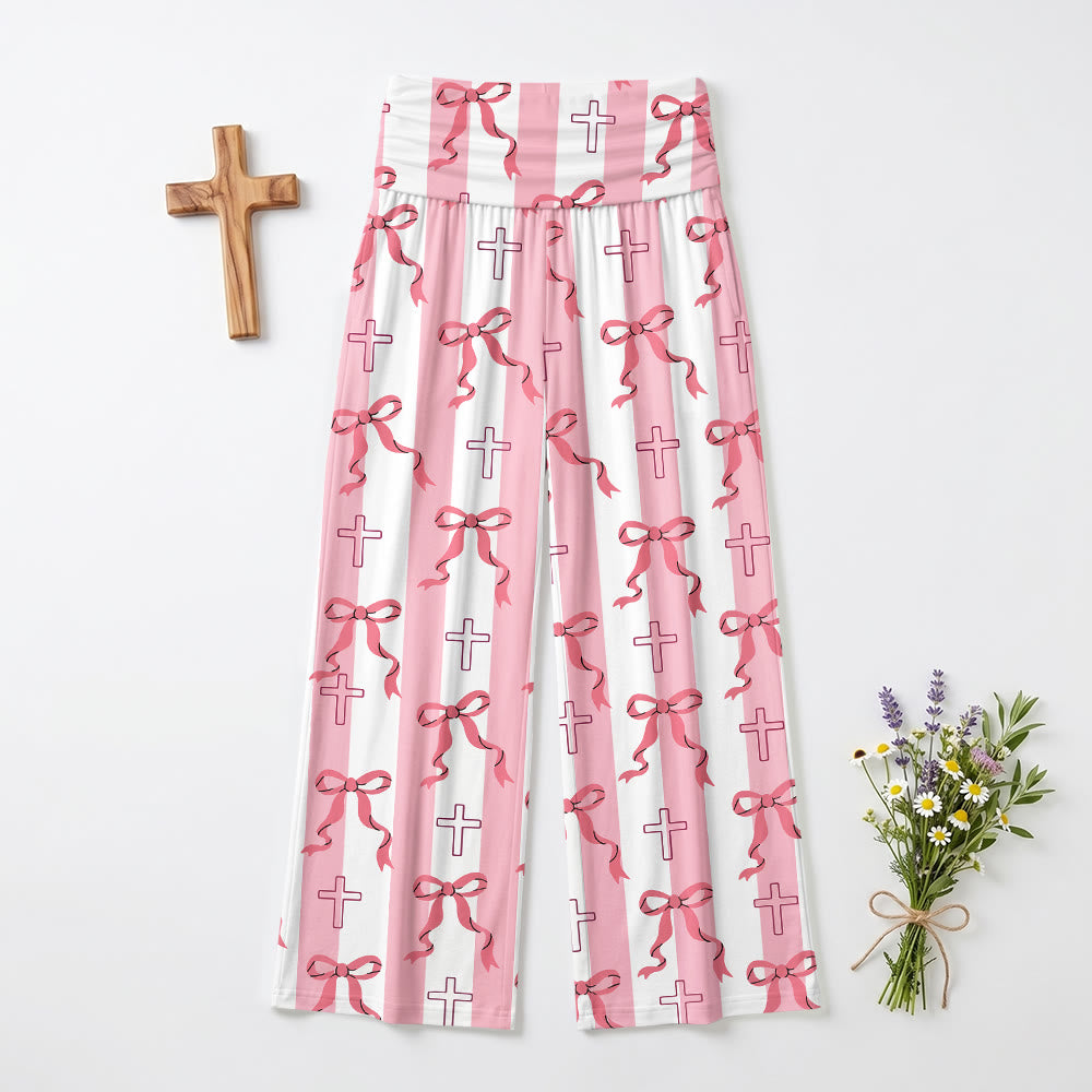 Christianartworkshop Pantaloni a gamba larga a vita alta con stampa a croce e contorno a righe verticali e fiocco, ripiegabili, con risvolto. - image 2