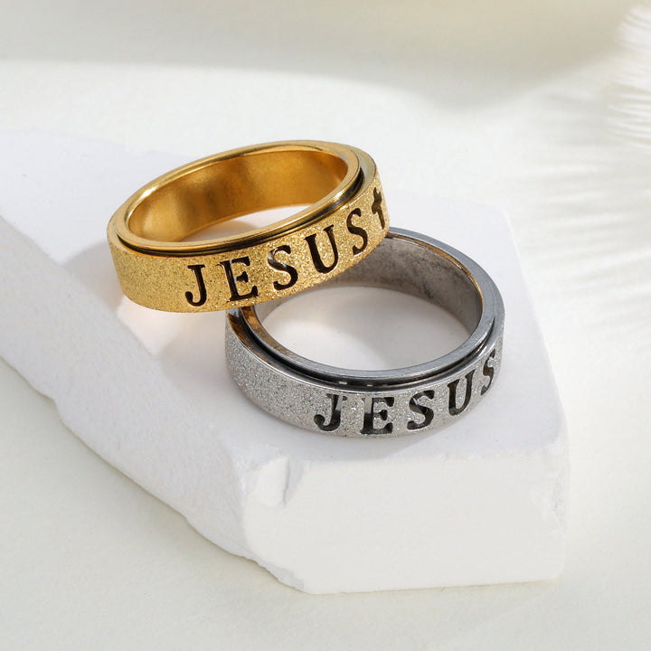 Christianartworkshop Anello girevole antistress con croce e scritta "JESUS" incisa: emblema senza tempo di una fede sacra incrollabile. - image 1