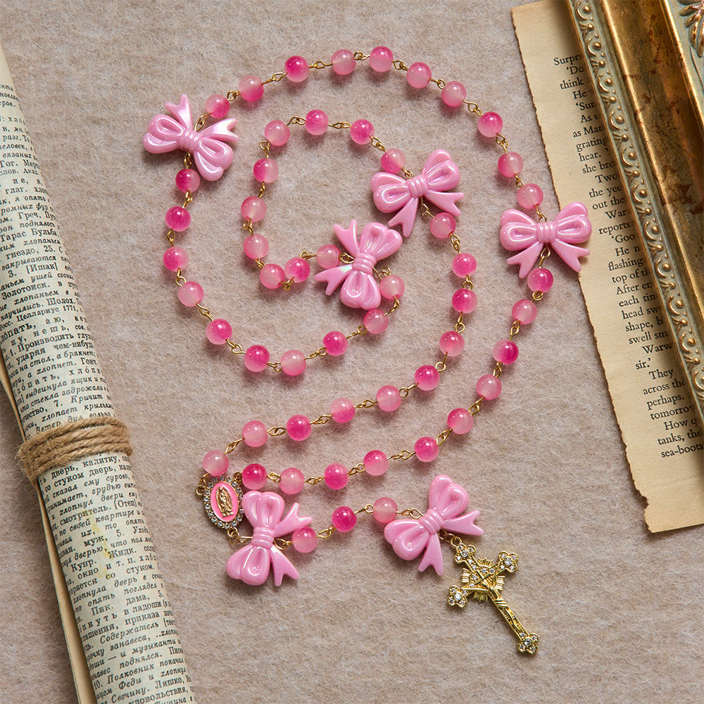 Christianartworkshop Rosario femminile con perline a doppia tonalità sfumate, fiocchi in resina lucida e crocifisso dorato con gemme. - Rosario con fiocchi rosa - image 0