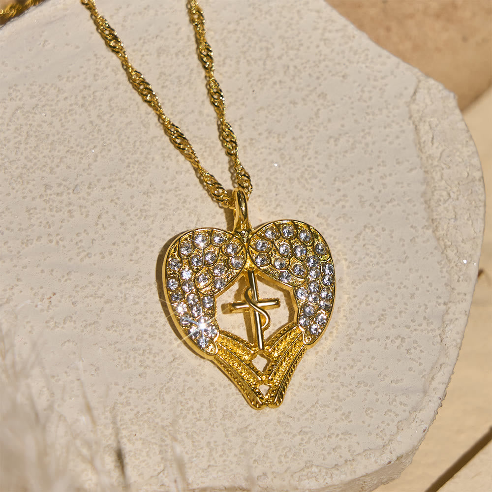 Collana con croce a cuore tempestata di zirconi e ali d'angelo Christianartworkshop : simbolo di amore e grazia divini. - image 1