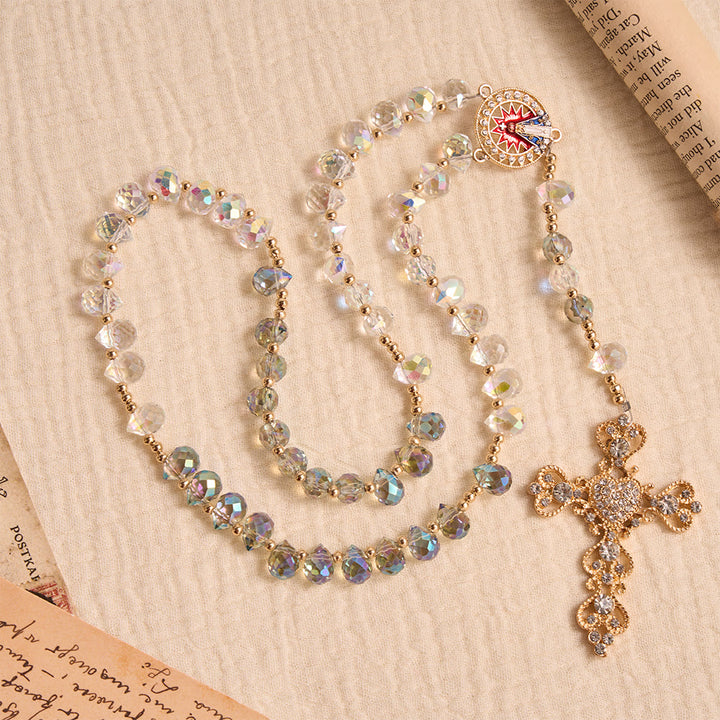 Christianartworkshop Rosario in vetro a goccia con sfumature iridescenti, croce dorata impreziosita da gioielli e medaglione della Madonna di Aparecida. - image 3