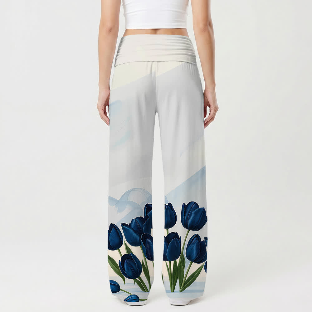 Christianartworkshop Pantaloni da donna a gamba larga con stampa floreale e scritta in spagnolo "Abbraccia Gesù" con tulipani blu e motivi floreali, ideali per uno stile casual e di fede. - image 2