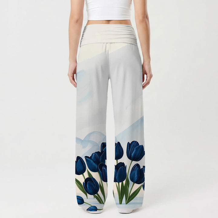 Christianartworkshop Pantaloni da donna a gamba larga con stampa floreale e scritta in spagnolo "Abbraccia Gesù" con tulipani blu e motivi floreali, ideali per uno stile casual e di fede. - image 2
