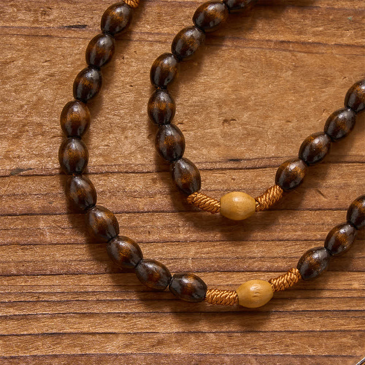 Christianartworkshop Rosario annodato con perline di legno naturale dalla texture terrosa: per la meditazione silenziosa e privata. - image 3