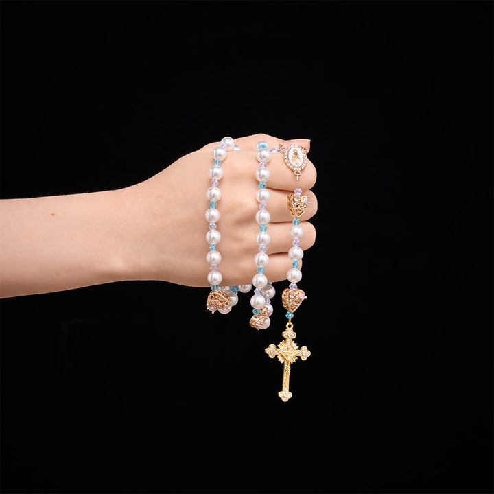 Christianartworkshop Rosario lucido con perle artificiali, ciondoli a forma di cigno e cuore con strass, medaglia della Madonna e crocifisso gioiello. - image 1