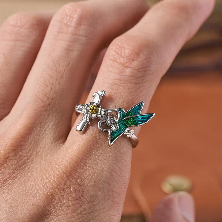 Christianartworkshop Anello con croce floreale e colibrì in smalto verde: emblema di vigile speranza celeste. - image 1