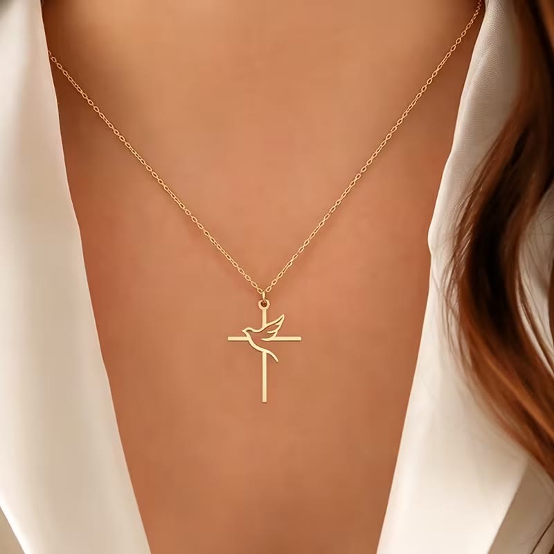 Christianartworkshop Collana con ciondolo a croce e colomba dal profilo minimalista: emblema di pura pace celeste. - image 1