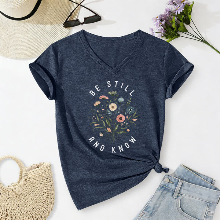 Christianartworkshop Maglietta da donna con scollo a V e orlo con nodo floreale "Be Still And Know" - Blu navy - 2XL - image 0