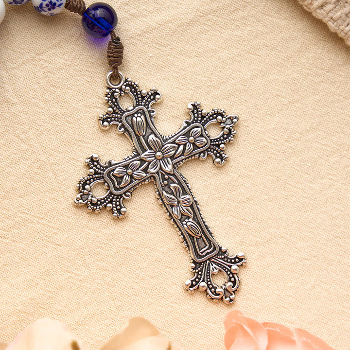 Christianartworkshop Rosario in porcellana blu e bianca con decorazioni floreali, croce in argento e medaglione della Vergine Maria. - image 7