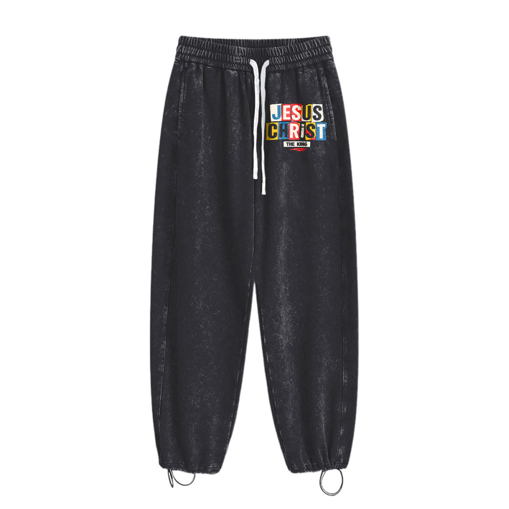 Pantaloni della tuta lavati con stampa retrò multicolore di Gesù Cristo Re, Christianartworkshop. - image 1