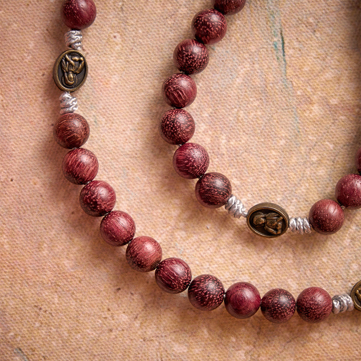 Christianartworkshop: Rosario della Madonna in legno di Purpleheart con devozione in bronzo. - image 2