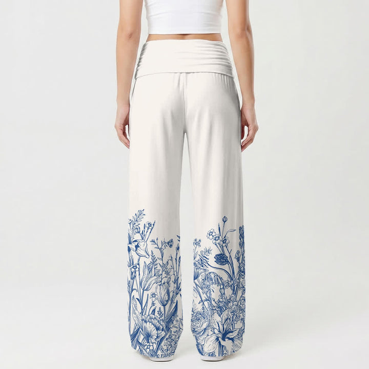 Christianartworkshop Pantaloni da donna a gamba larga con orlo floreale blu YHWH risvoltati - image 1