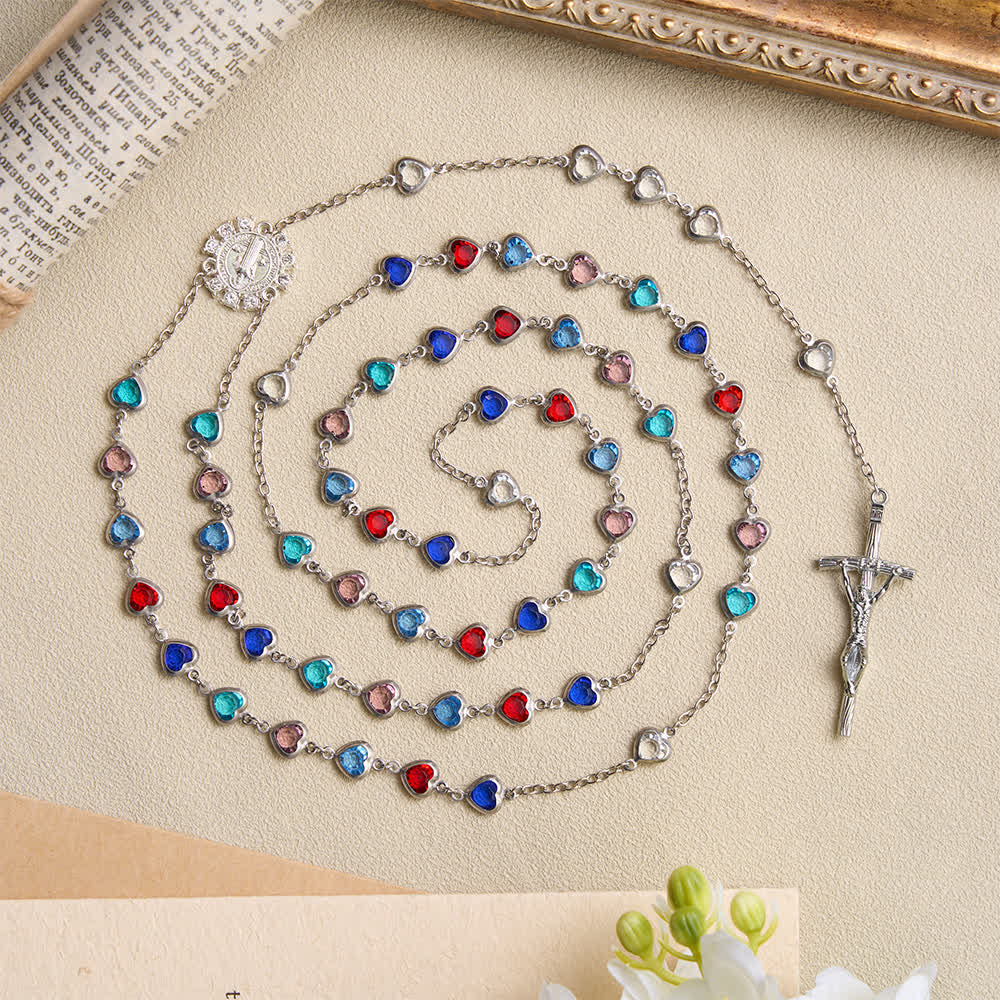 Christianartworkshop Rosario a forma di cuore color argento con zirconi e medaglione di San Benedetto: emblema della dolce grazia celeste. - Rosario con perline di zirconi a forma di cuore - image 0