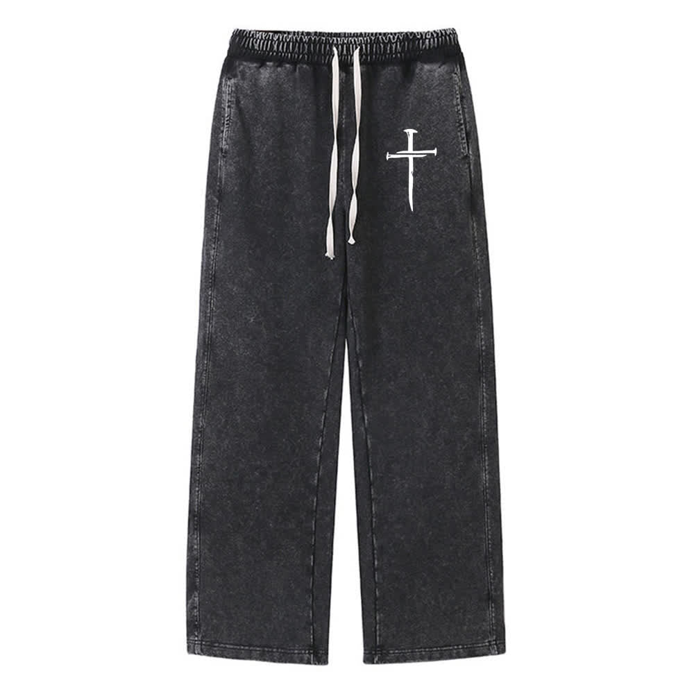 Christianartworkshop Pantaloni della tuta streetwear vintage con grafica a croce, effetto lavato. - Nero - 2XL - image 0