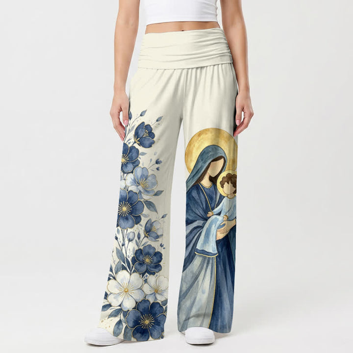 Christianartworkshop Pantaloni da donna a gamba larga con stampa floreale blu, con Madonna e Bambino. - image 2