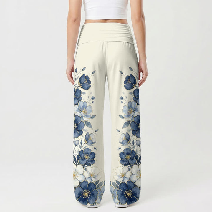 Christianartworkshop Pantaloni da donna a gamba larga con stampa floreale blu, con Madonna e Bambino. - image 1