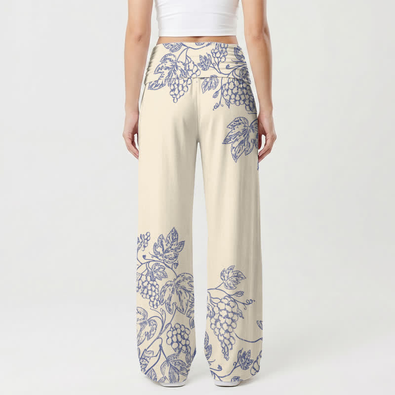 Christianartworkshop Pantaloni a gamba larga da donna Walk By Faith con stampa a tralci blu. - image 1