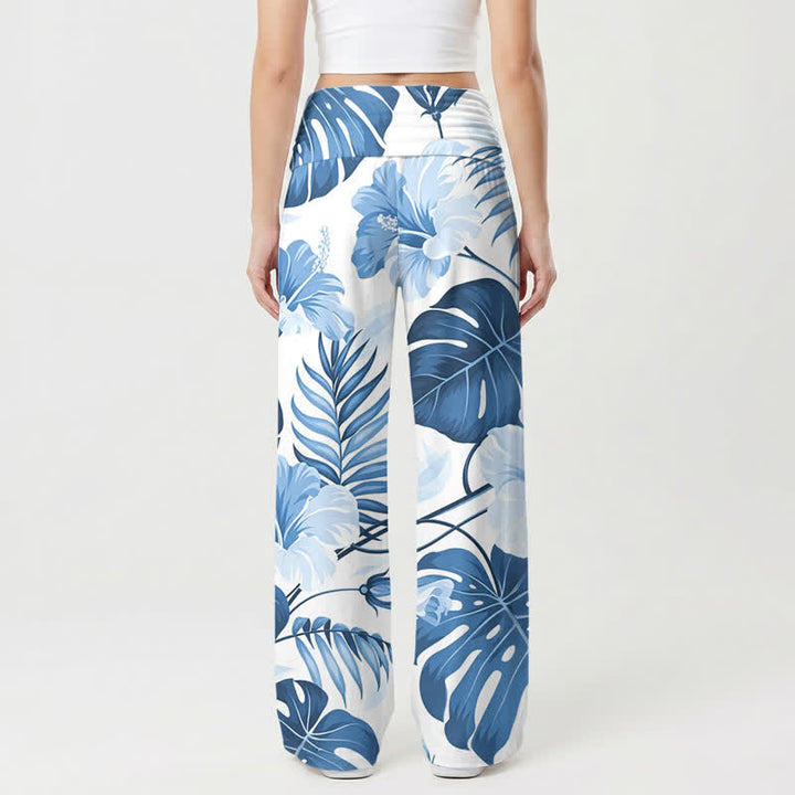 Christianartworkshop Pantaloni da donna a gamba larga a vita alta con stampa floreale tropicale blu - image 1