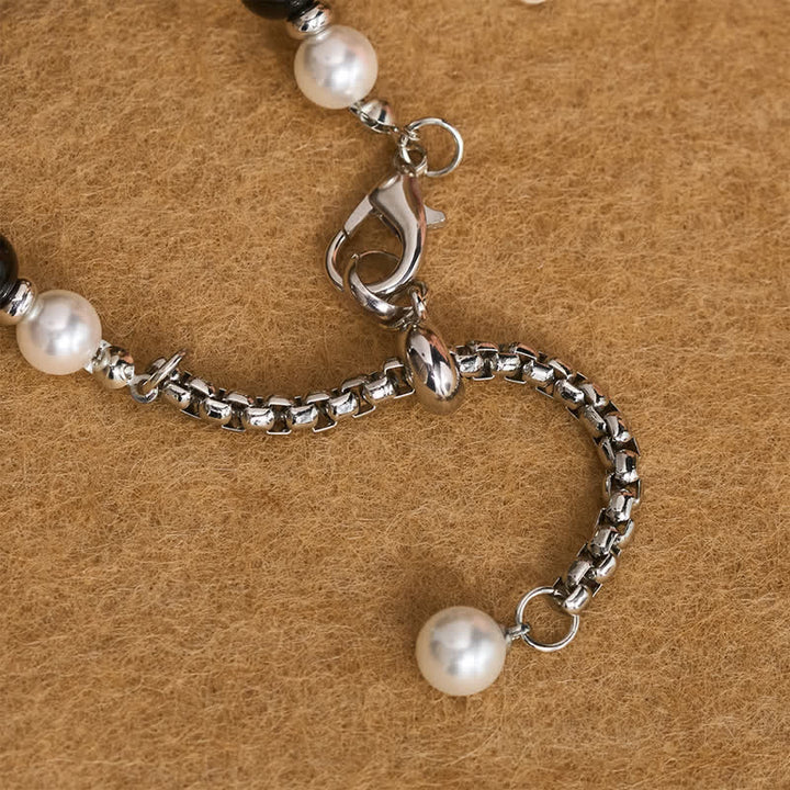 Christianartworkshop Collana con croce di perle scintillanti e lucide: segno di una costante guida celeste. - image 6